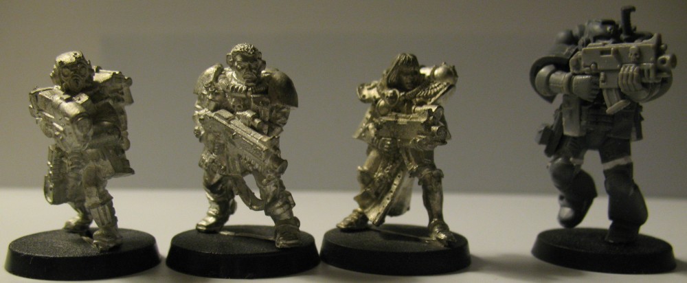 True Scale Space Marine next to 28mm Battle Sister, Space Marine Scout and classic Imperial Guard Stormtrooper