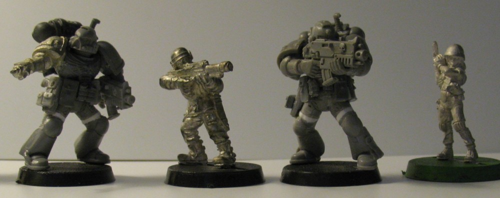 True Scale Space Marines prototype models next to classic metal Cadian Shock Trooper and Hasslefree McKenzie.