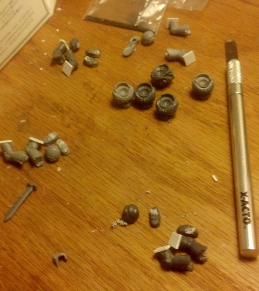 batches of Space Marine legs and torsos being cut apart and reassembled for True Scale Space Marine conversion